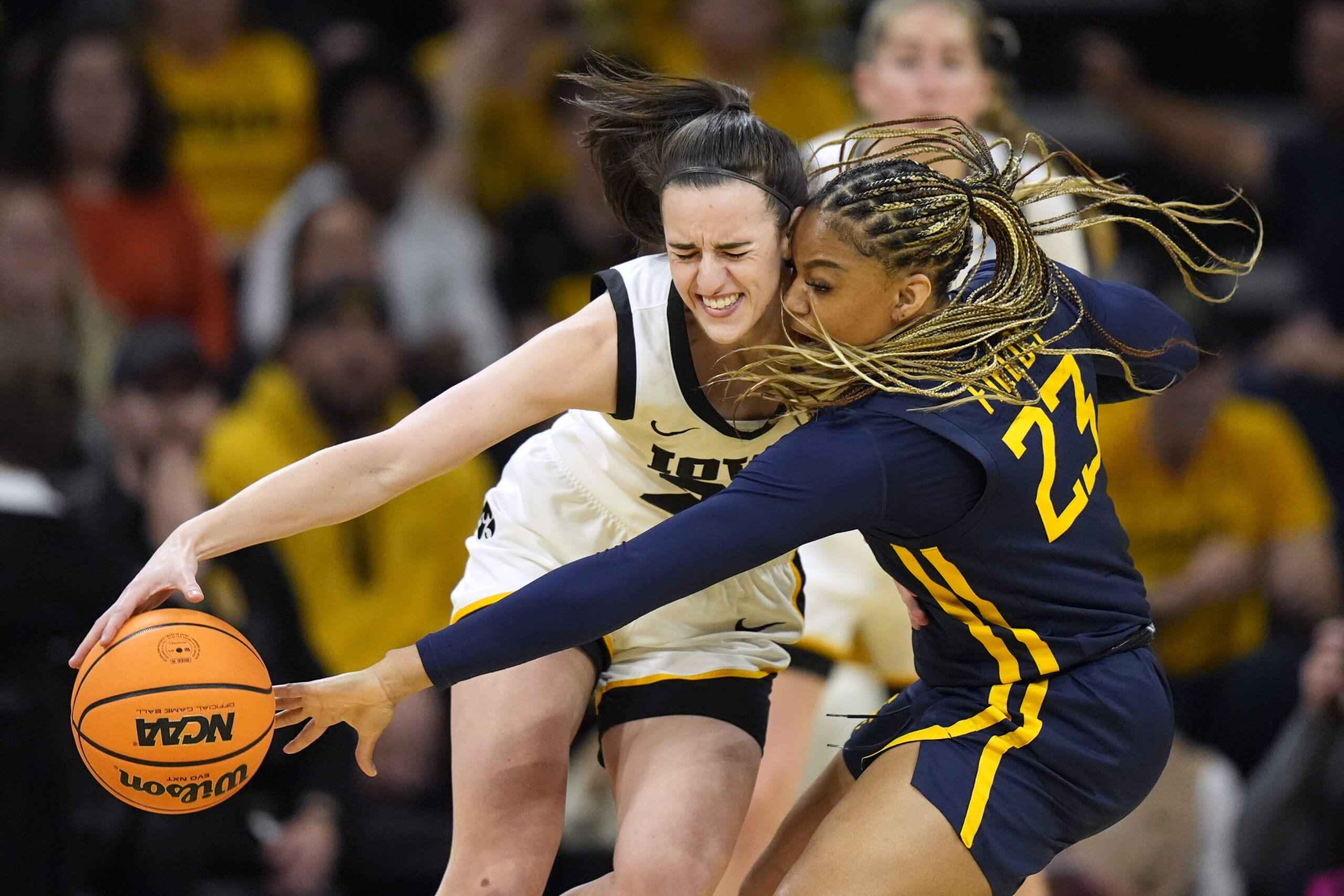 Iowa, Clark eliminate WVU from NCAA tournament with a 64-54 victory